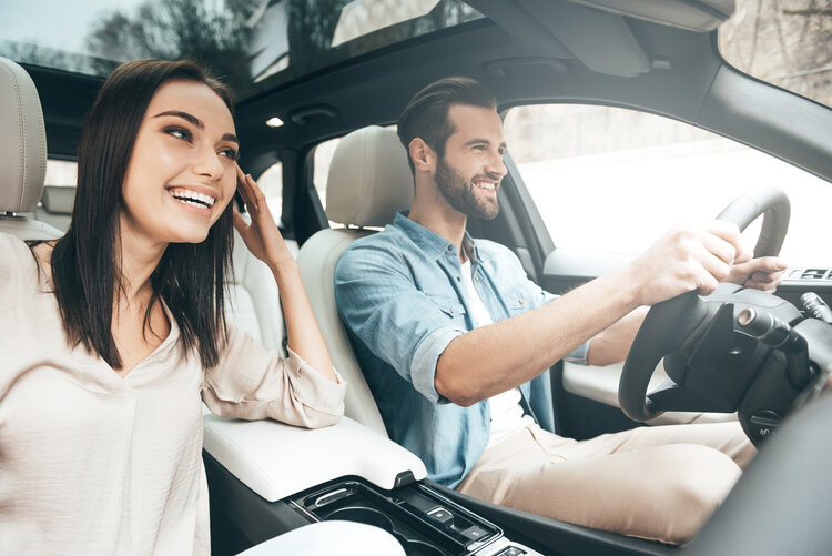 couple in car listening to music