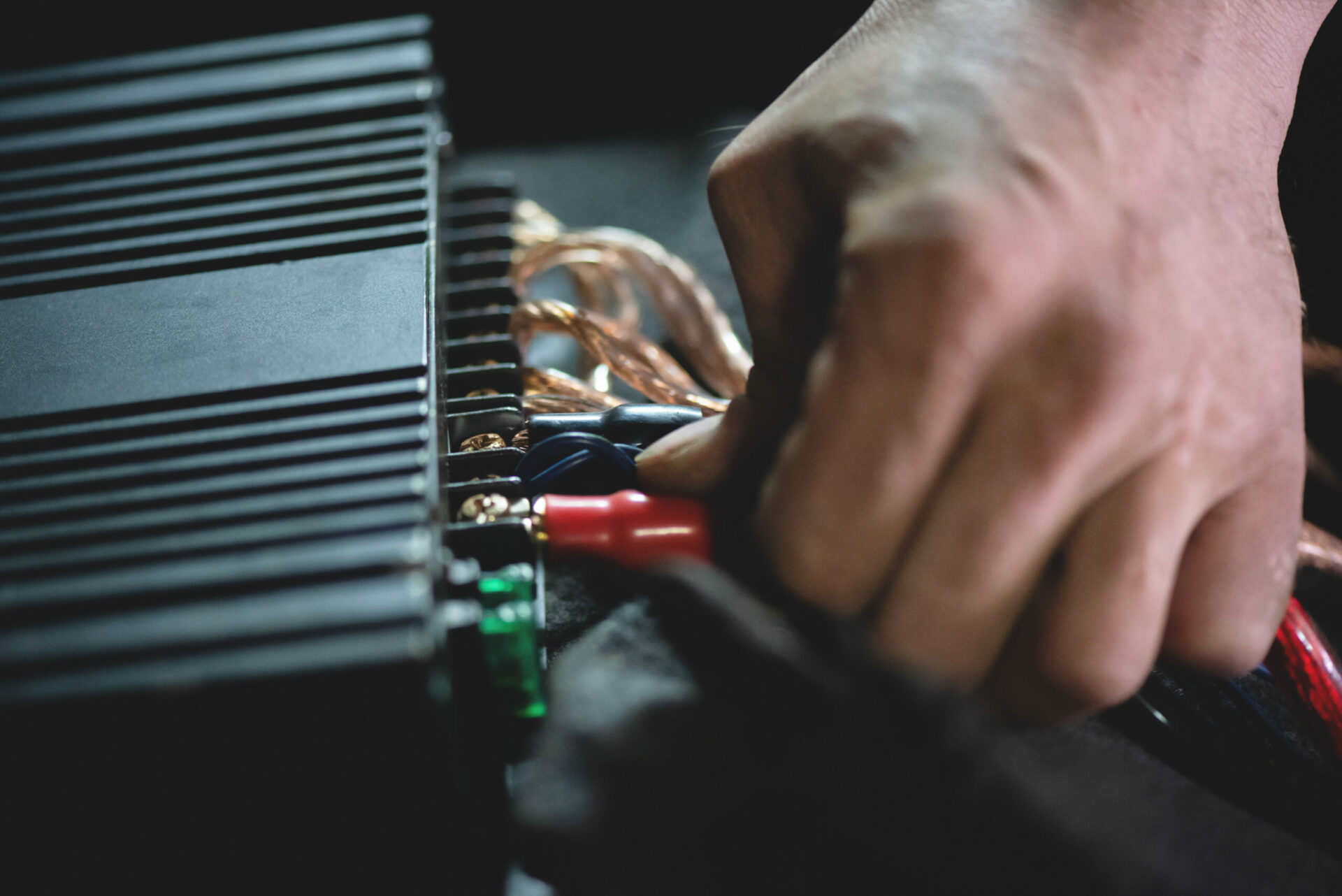 insalling a car amplifier close up