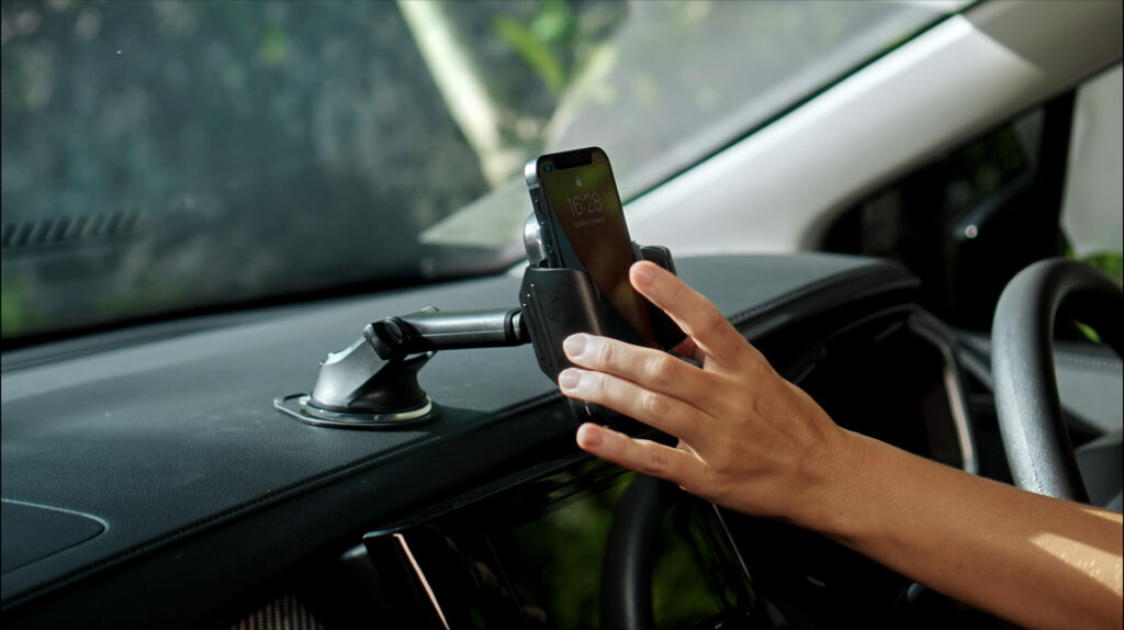 In-car phone mount on dashboard