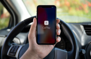 woman holding apple iphone