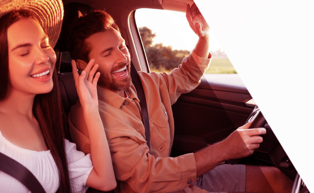 couple enjoying car audio