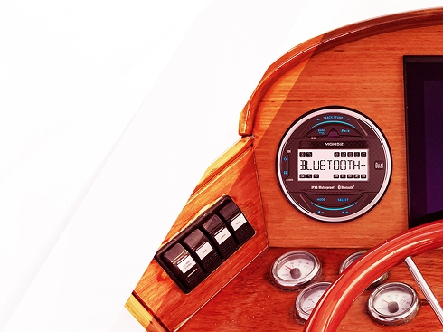 Boat gaugehole receiver mounted in wooden boat console
