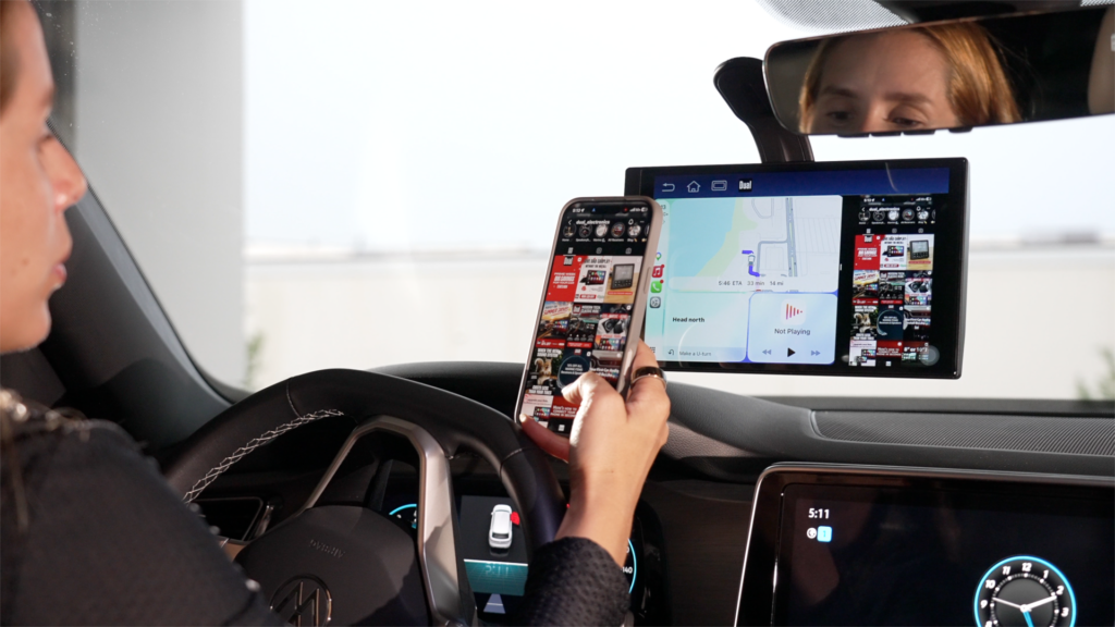 Driver using Dual DMD10W Portable CarPlay Device with Screen Mirroring